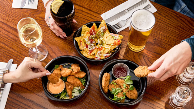 Traditional Two Course Meal for Two with a Drink at a British Pub picture