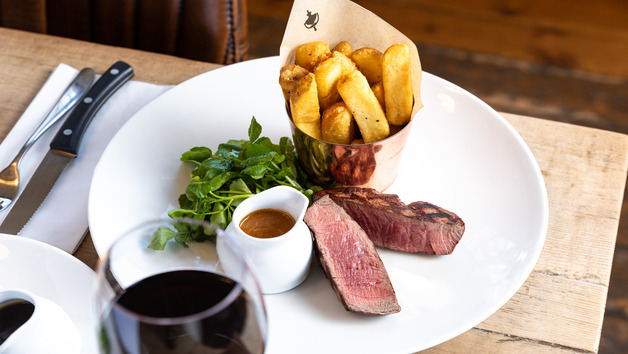 Steak with a Bottle of Wine at a British Pub or Bar for Two picture