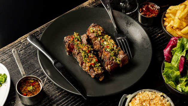 Sharing Steak, Sides and Bottle of Wine at Gaucho for Two Image 2