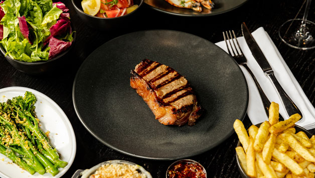 Sharing Steak, Sides and Bottle of Wine at Gaucho for Two picture
