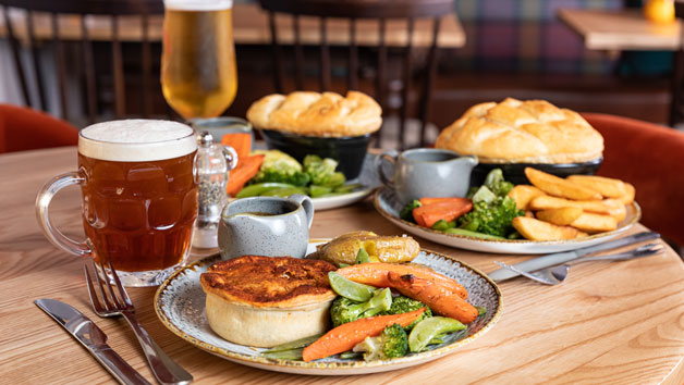 Two Course Meal with a Drink at a British Pub or Bar for Two picture