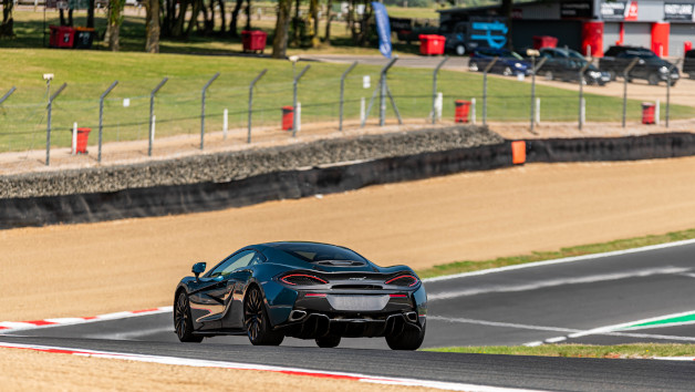 McLaren Road Car vs GT4 Race Car Driving Experience with Car Chase Heroes for One picture