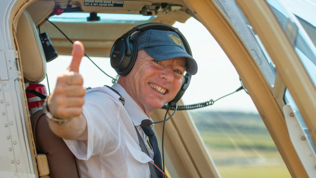 12 Mile Buzz Flight in a Helicopter Co-Pilot Seat with Aviation Key Ring and £5 Beer Token for One picture