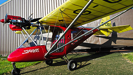 Extended Fixed Wing Microlight Flying in Lancashire