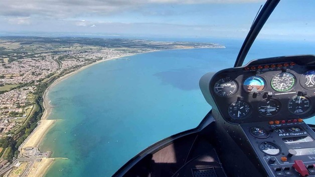 Private 12 Mile R44 Helicopter Flight for up to Three People picture