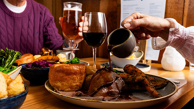 Sunday Roast with a Glass of Wine at a British Pub or Bar for Two Image 3