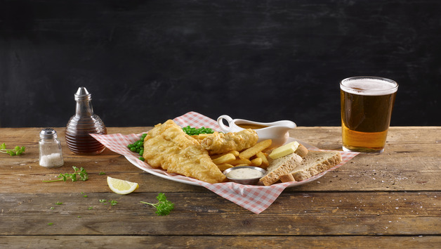 Fish and Chips Feast with a Drink at a British Pub or Bar for Two Image 1